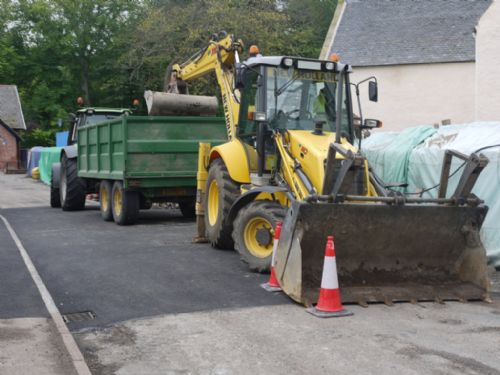 digger and tractor on Church St